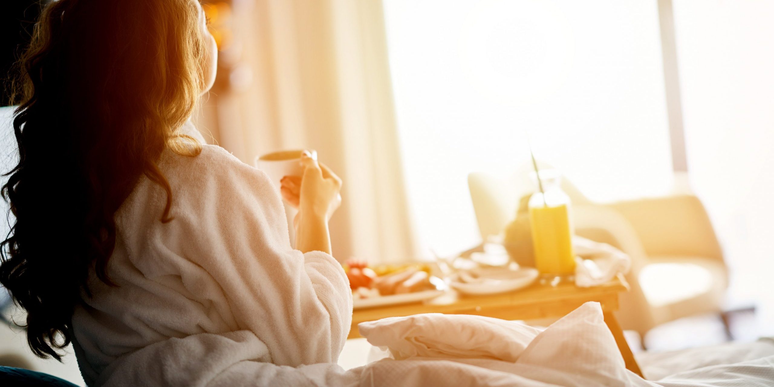 Breakfast in bed, cozy hotel room. concept